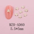 Close-up of 5.5x5mm gold alloy star charms applied on pink nails and loose pieces - Gold Textured Star (AD60) / 5.5x5mm
