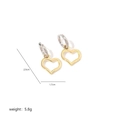 Minimalistische hartoorbellen in goud en zilver tweekleurig met hol ontwerp - Grote Holle Ster / Goud en Zilver Tweekleurig