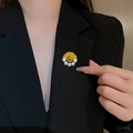 Elegant sunflower brooch with yellow petals and pearls on a black blazer lapel - Yellow Sunflower with Pearl (E30887)