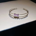 Silver-finish double-layer open bangle with pink crystal bow and rectangular zircon stones - Double Layer Bow Bangle / Silver Pink