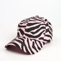 Close-up of pink zebra print baseball cap showing diagonal twill texture and stitching - Adjustable / Pink Zebra