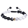 Detail of 10mm faceted black onyx and turquoise beaded bracelet with gold spacers - White Howlite Bracelet
