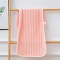 Pink coral fleece towel with vertical striped texture and white braided edge trim - Towel (35x75cm) / Pink