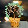 Handmade Green Aventurine crystal tree with copper wire on a yellow woven basket base - 18 Crystals Green Aventurine (Resin Pot)