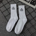 White mid-calf cotton socks featuring black NO DRAMA PLEASE embroidered text - No Drama Please