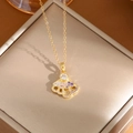 Elegant gold fan pendant necklace with colorful rhinestones on a display box - A0120 Gold Fan Shape