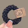 Black high-elasticity braided hair tie featuring a cute brown cartoon bear patch - Black Braided Hair Tie with Bear Tag 1Pc