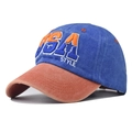 Detailed close-up of USA embroidery and washed cotton fabric on retro baseball cap - Adjustable / Royal Blue