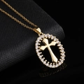 Elegant gold cross pendant necklace with sparkling white zircons on a textured black background - Gold Oval Frame Pavé Cross (款式44)