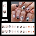 Press-on nail set featuring checkerboard, flame, and smiley face patterns in orange and black - Funny Expression (W151)