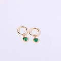 Golden hoop earrings with green heart-shaped crystal pendants on a clean white background - May / Emerald