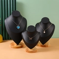 Three-piece black matte necklace bust displays with round solid wood bases in tiered heights - S/M/L Size Combination / Black PU Leather