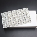 Oval clear white nail art rhinestones neatly arranged in a professional storage tray - 7*9mm (42 Pcs) / Crystal White