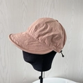 Detail of adjustable drawstring and lightweight textured fabric on dusty pink sun hat - Pink