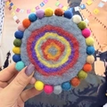 Handmade grey wool felt coaster with rainbow concentric rings and colorful pom-poms - Blue Base (Random Colored Circles)