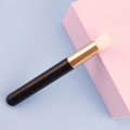 Detail view of a professional eyelash cleaning brush with white bristles and golden ferrule - Black Without Lash Pattern