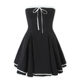 Abito corto senza spalline vintage bianco e nero con fiocco e gonna a pieghe - S / Nero