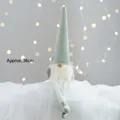 Morandi green Christmas gnome plush with long legs and soft knit hat, approx. 38cm tall - Green Sitting Gnome with Long Legs 38cm