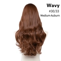 Detail of medium auburn wavy U-part hair extensions shown from the back on a mannequin - 24 inch / Medium Auburn (#30/33)
