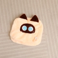 Detailed close-up of a square plush cat pillow case in beige with blue embroidered eyes - 20cm No Filling No Zipper / Cream Brown Cat Shell