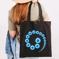 Schwarze Canvas-Einkaufstasche mit blauen griechischen Evil Eye Spiralmustern - Design A-Spiralauge-Schwarz