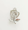 Macro view of silver rose flower pendant with rhinestones and rose gold leaf detail - Pearl White Silver