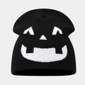 Detailed knit texture of black Halloween beanie featuring a white pumpkin face pattern - Style D Black+White (Gapped Teeth Pumpkin)