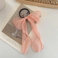 Pink lace bow hair tie with long ribbons and lightweight texture on aesthetic card - Korean Pink