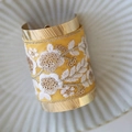 Gold metal wide cuff hair hook with yellow silk and white floral embroidery details - Yellow Floral Embroidery
