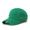Detailed close-up of green distressed baseball cap featuring vintage ripped hole effects - Green