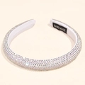Detail of a thick white headband with hand-set rhinestones and a hand-made label - 1.5cm wide / White