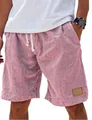 Detail of pink men's linen shorts showing elastic drawstring waist and fabric texture - Lotus Pink