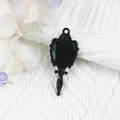 Classic black vintage frame pendant with ornate details on soft white fabric - 4-Black Mirror