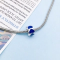 Silver snake chain bracelet with a deep blue enamel heart charm bead and metal accents - Dark Blue