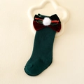 Dettaglio di calze alte bimbo verdi con fiocco di velluto rosso e pompon bianco natalizio - S 0-6 Mesi / Verde Scuro (Palla Bianca Bicolore)