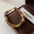 Multicolor beaded bracelet with round stone discs and adjustable gold lobster clasp - Egg Yolk Stone Bracelet SL0155