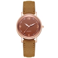 Detail of rose gold quartz watch featuring a dark brown dial with rhinestone indices - Brown
