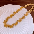 Detail of a golden butterfly necklace set on silk fabric and embossed plate decor - 11# Gold Butterfly Necklace (Titanium Steel)
