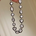 Eleganter dunkler Metallarmband mit Zirkonia in runden, Herz- und Tropfenformen - Armband / Schwarz