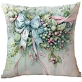 Mint green Christmas cushion cover featuring festive bow and holly berry illustrations - Big Blue Bow with Berries