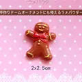 Detail of 2x2.5cm gingerbread man resin charm with red bow for DIY jewelry making - Chubby Gingerbread Girl