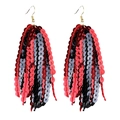 Close-up of red and black sequin tassel earrings with golden hooks for sports fans - Red & Black