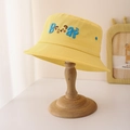 Detail of yellow kids bucket hat with Bear embroidery on a wooden display stand - 50-52cm (2-6 Years) / Yellow