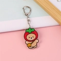 Cute acrylic teddy bear keychain wearing a strawberry hat hanging on a silver metal ring - Strawberry Bear