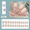 Set di 24 unghie finte corte nude con motivi a stelle, fiocchi e cuori da applicare - R853 Design a Stella e Cuore (Colla Inclusa)