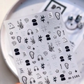 Cartoon style nail stickers M-1181 featuring black and white cat and guitar graphics - M-1181 Colored Silver