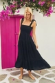 Dettaglio dell'elegante abito nero senza schiena con gonna a balze e spalline intrecciate chic - 2XL / Nero