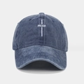 Detailed close-up of white PEACE embroidery on a dark blue washed cotton baseball cap - One Size / Navy Blue