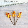 Three-piece set of artificial berries in glossy orange gradient on a wooden background - Yellow-Red Gradient Berry 6-Fruit Branch