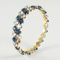 Double-row wrap bangle with blue and white cubic zirconia in gold plated spiral setting - White and Blue Zirconia
